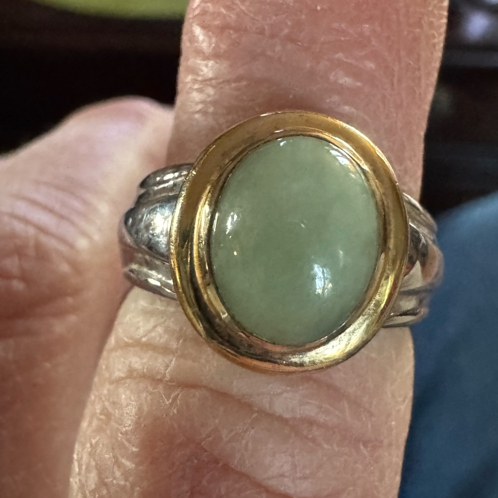 Elegant Gold and Silver Ring with Green Stone 
Size 5